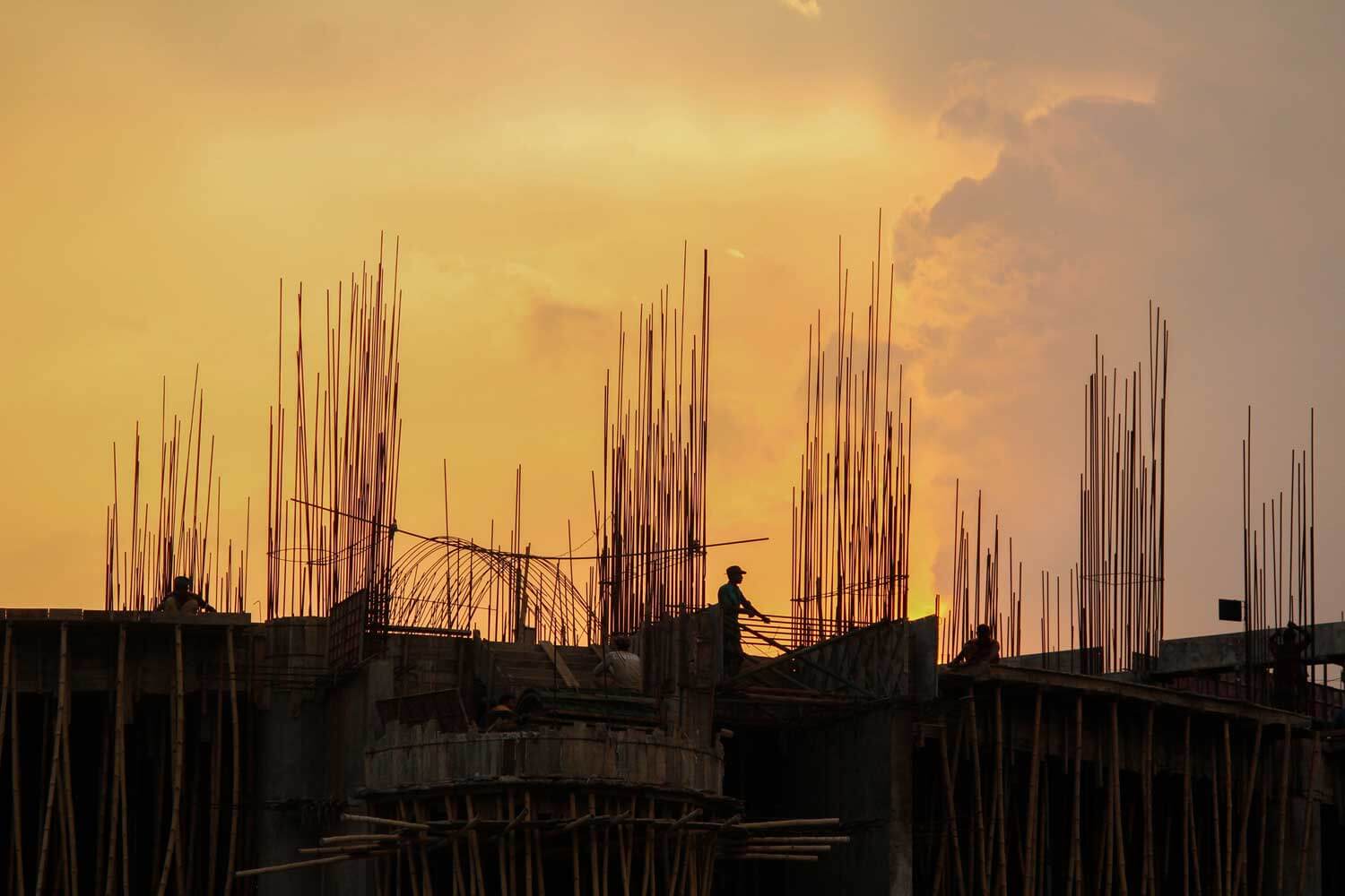 gold sunset over unpinning construction